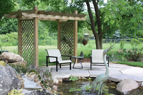 A Small Back Yard Patio with Pergola