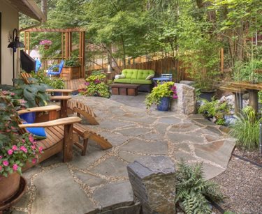 Rustic Garden, Container Plantings, Garden Decor, Adirondack Chairs, Flagstone, Water Feature
Gregg and Ellis Landscape Designs
Portland, OR