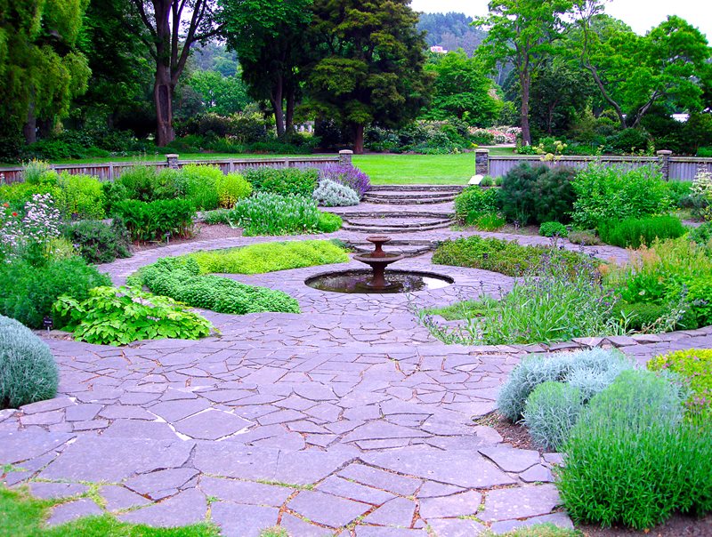 Circular Garden With Fountain At Center, Flagstone Paving
Flagstone
Landscaping Network
Calimesa, CA